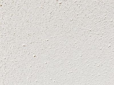 Textured stucco exterior wall surface